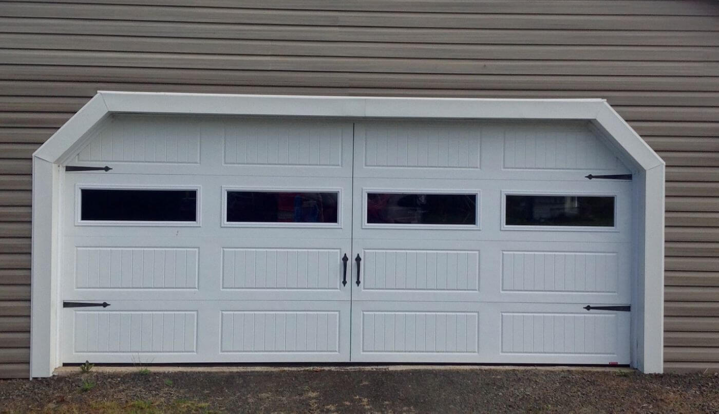 A garage door featuring windows, showcasing a clean and modern design.